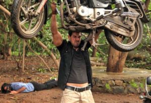 John Abraham Lifting A Bike In Force