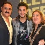 Aadar Jain with his parents