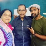 Bosco Martis with his parents
