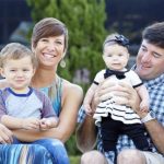 Angie Watson with her husband and children