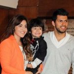 Giannina Maradona and Sergio Aguero with son