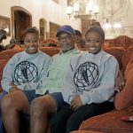 Simone and her sister with their father