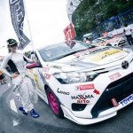 Alisha Abdullah in a car race