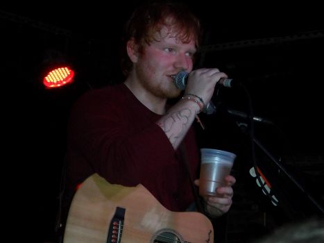 Ed chug beer