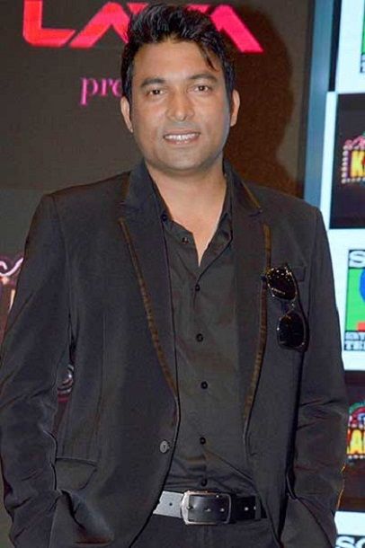 Chandra Prabhakar posing at an event