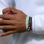Moeen Ali wearing wristband