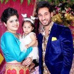 Gaurav Ajay Kaura with his wife and daughter