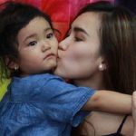 single mother Ayu Ting Ting with her daughter
