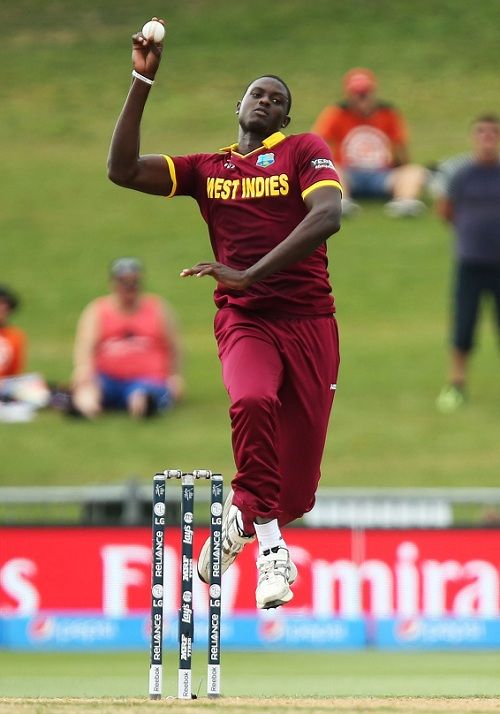 Jason Holder bowling