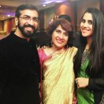 singer Nikhita Gandhi with her parents