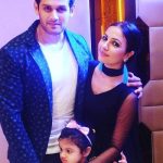 Vishal Nayak with his wife and daughter