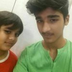 Uzair Basar with his brother