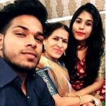 Nishant Koli with his mother and sister