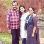 Anju Kurian with her parents