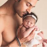 Guru Mann with his daughter