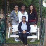 Regina Ramjit with her mother and sisters