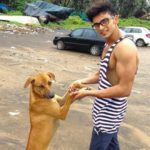 Ankit Raizada with a street dog