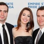 Anne Hathaway with her brothers