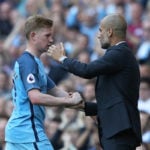 Kevin de Bruyne with his coach Pep Guardiola