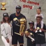 LeBron James with his wife and children