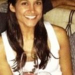 Melanie Chandra Drinking Wine