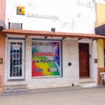 Paulo Dybala's Parent's Lottery Shop with the entrance to his childhood home on the right