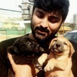 Samrat Reddy with his pet puppies