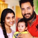 Syamala with her husband and son