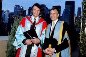 Liam Nesson with his honorary doctorate given by Queen’s University