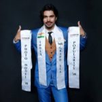 Shiyas Kareem holding the titles