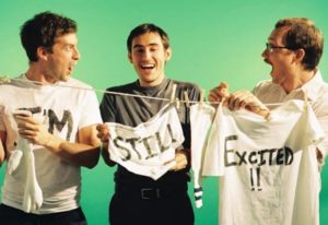 Mark Duplass along with his two friends comprising the Rockband, "Volcano, I’m Still Excited!"