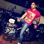 Mehul Bhojak poses with his Royal Enfield bike