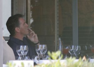 Pierce Brosnan smoking