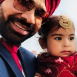 Harby Sangha with his daughter