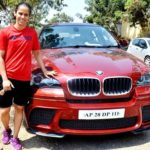 Saina Nehwal poses with her BMW car
