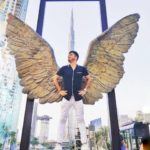 Abhay Jodhpurkar posing in front of Burj Khalifa in Dubai