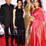 Ujjala Padukone with her husband and daughters