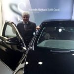 Suhel Seth poses with his Mercedes-Benz S600 car