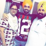 Jordan Sandhu with his parents