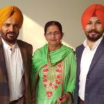 Parkash Gadhu with his wife and son