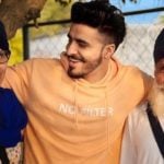 Tyson Sidhu with his parents