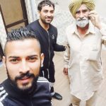 Garry Sandhu with his father and brother