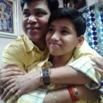 Digamber Naik with his son