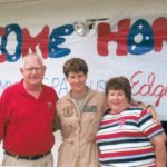 Amy McGrath with her parents