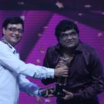 Ashok Saraf receiving an award