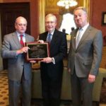 McConnell receiving Excellence in Leadership Award