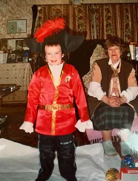 Childhood photo of Cometan with his Grandmother