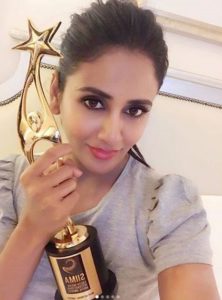 Parul Yadav with an award