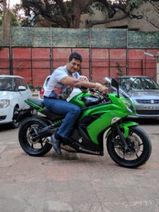 Mahendra Murlidhar Ghule riding his bike