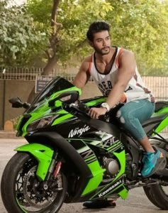 Varun Verma riding a bike